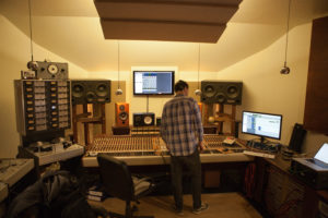 Music producer in the control room